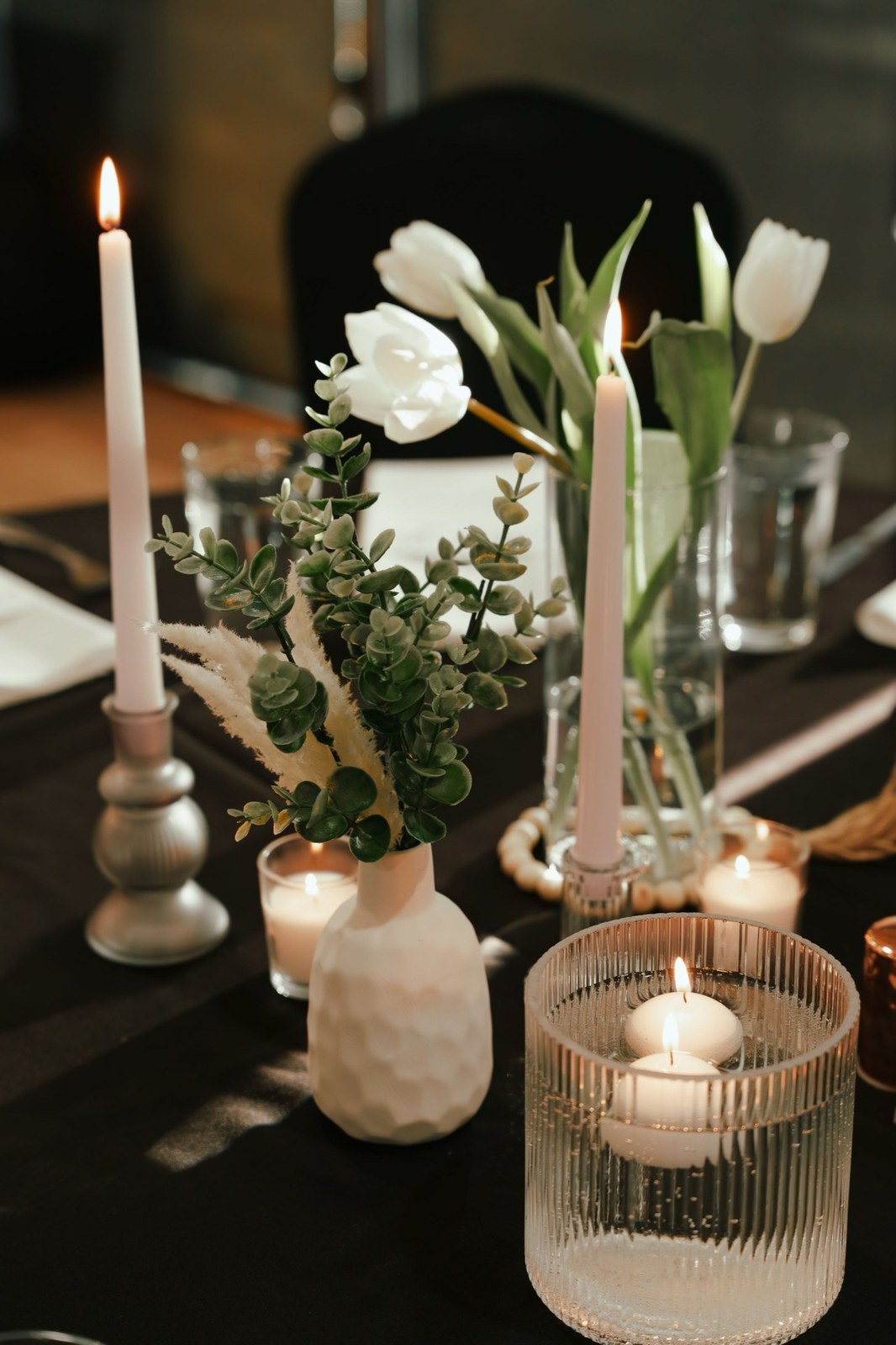 Candlelit reception table with white tulips
