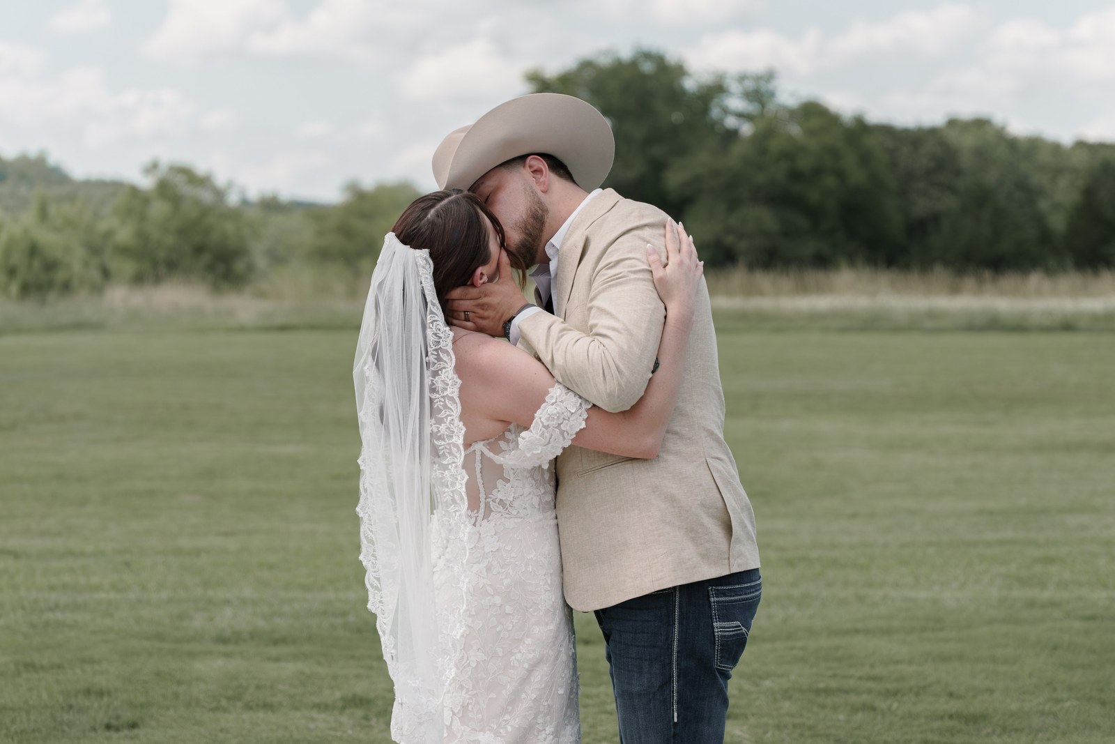 Bride and groom sharing a kiss after the ceremony